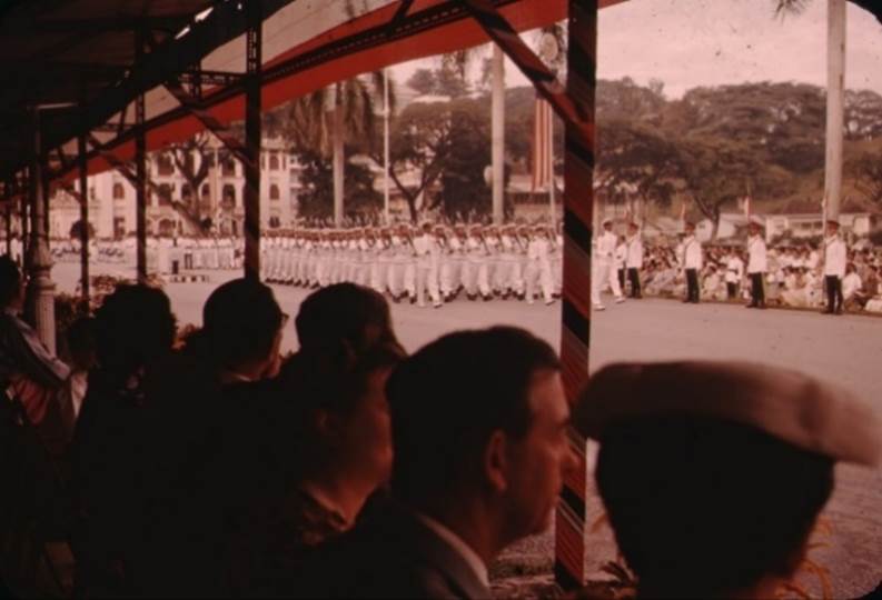 A picture containing person, building, people, crowd
Description automatically generated